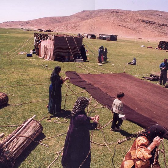 nomad people preparing their handmade tents as their house in nature, Iran