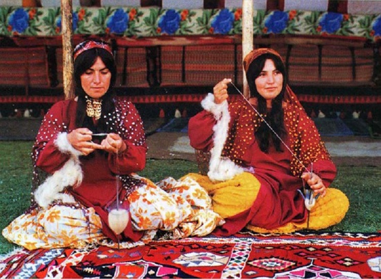 Nomads spinning wool for Persian carpets