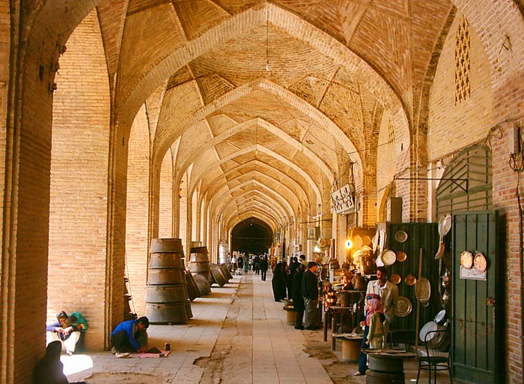 a traditional bazaar with arch ceiling in Ganjali Khan Bazaar