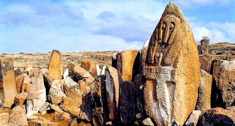 Imanali Imani a large standing stone 1 - Shahar Yeri Temple (Shahr-e Yeri) - Meshgin Shahr, Ardabil, Iran