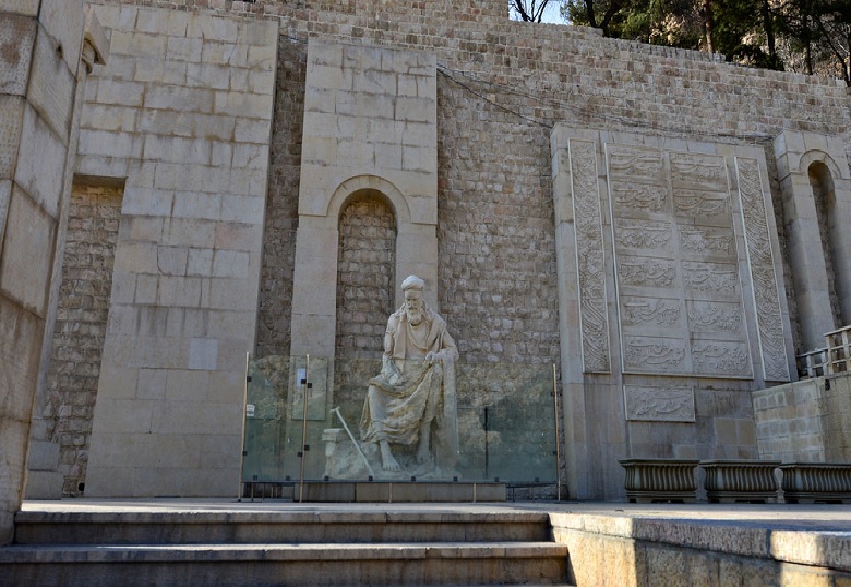 Khaju Kermani statue and poems photo - Shiraz Quran Gate