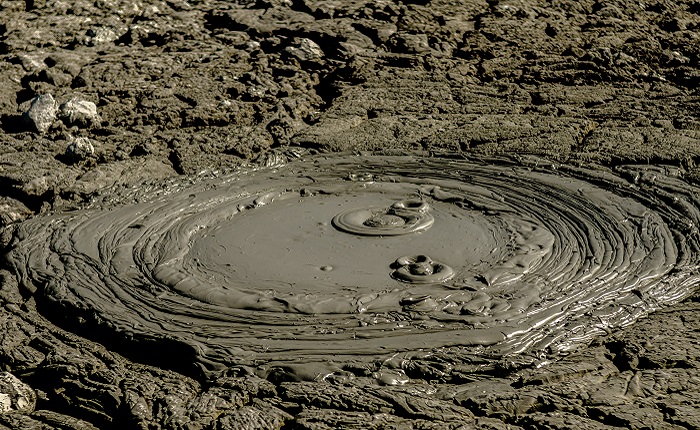 mud bubbles in mud spring in mud spring, Chabahar attraction, Iran 