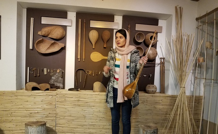 The guide introducing a Instrument in Music Museum - Isfahan Museums - Iran