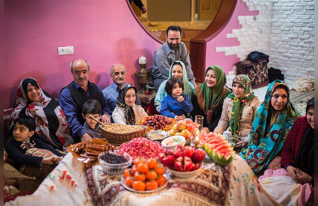 A happy Iranian family who gathered on the Yalda night