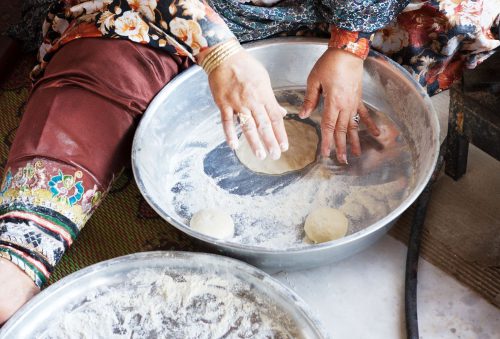 stock photo hands of woman preparing to cook bread hormuz island iran middle east daily life routine in 134 500x339 - BEST Iranian Islands Tours 2024 | Kish, Gheshm, Hormuz & Hengam Tour